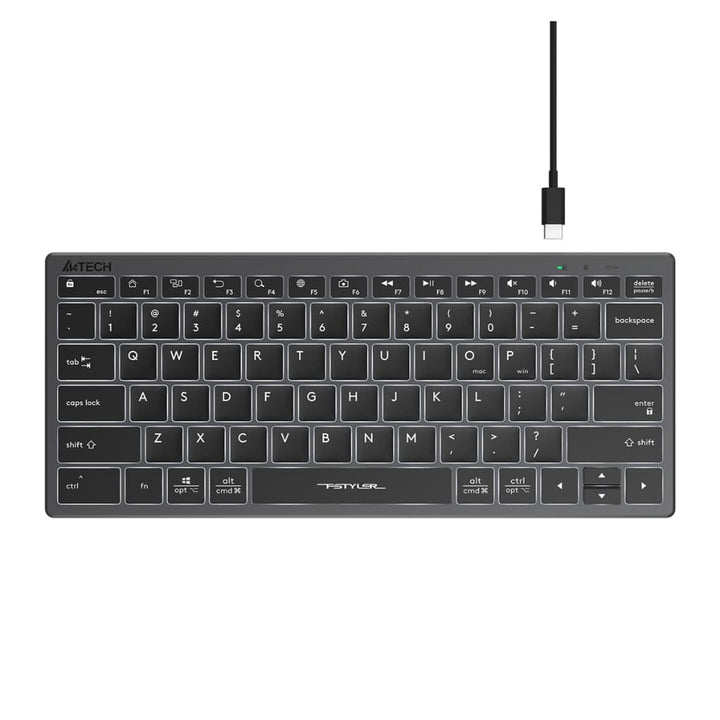 A sleek dark gray compact keyboard with white backlit keys.