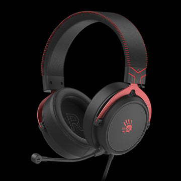 Black gaming headset with red accents on a black background