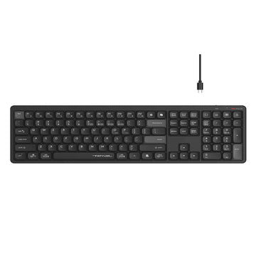 Black keyboard with wireless receiver on a white background