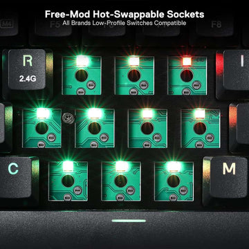 Detail view of REDRAGON K632 RGB Mechanical Keyboard featuring free-mod hot-swappable sockets for customizable switches with RGB