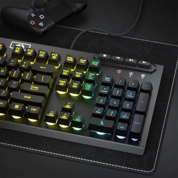A top-down view of the Redragon K513 RGB Membrane Gaming Keyboard, showcasing its full layout including media control buttons with number pad 