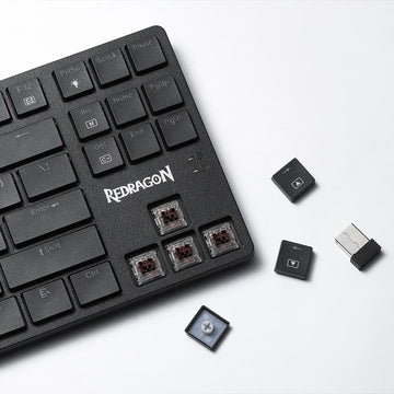 Redragon K539 Anubis Black RGB Keyboard with removed keycaps highlighting brown mechanical switches