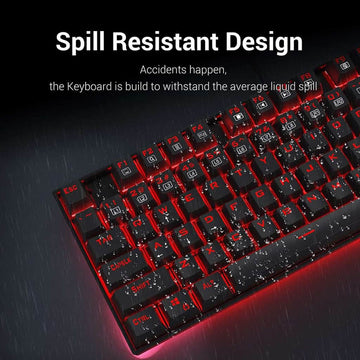 Redragon K552 Red Kumara mechanical keyboard with water droplets on the keys, demonstrating its spill-resistant design
