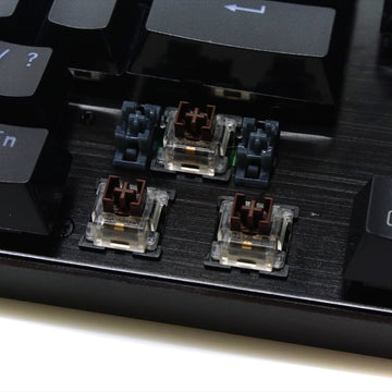 Redragon K556 Devarajas RGB Gaming Keyboard's brown mechanical switches, displaying their tactile feel & RGB backlighting
