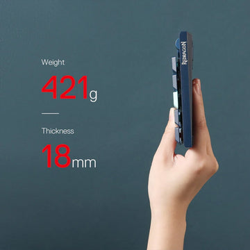 Redragon K632 PRO blue Wireless RGB Mechanical Keyboard, held to show its slim 18mm thickness and lightweight 421g design