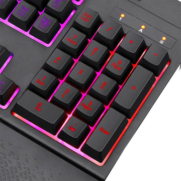 The number pad on the Redragon K512 Shiva RGB backlit membrane gaming keyboard, highlighting the vibrant pink and red illumination.