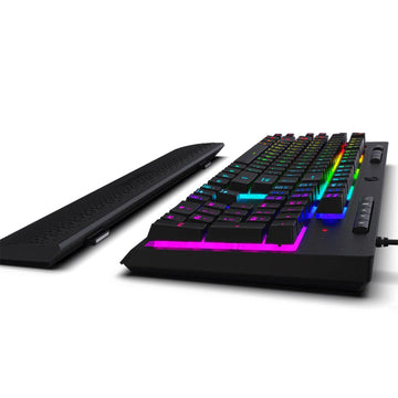 Redragon K512 Shiva RGB membrane gaming keyboard (black) from the side, displaying its profile, detachable wrist rest, and vibrant side lighting